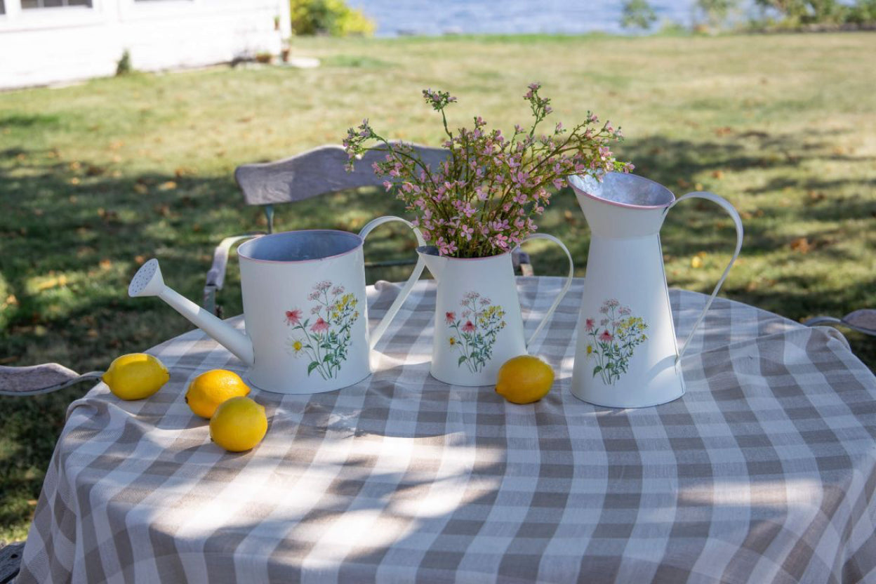WATERING CAN WITH FLORAL EMBOSS DESIGN
