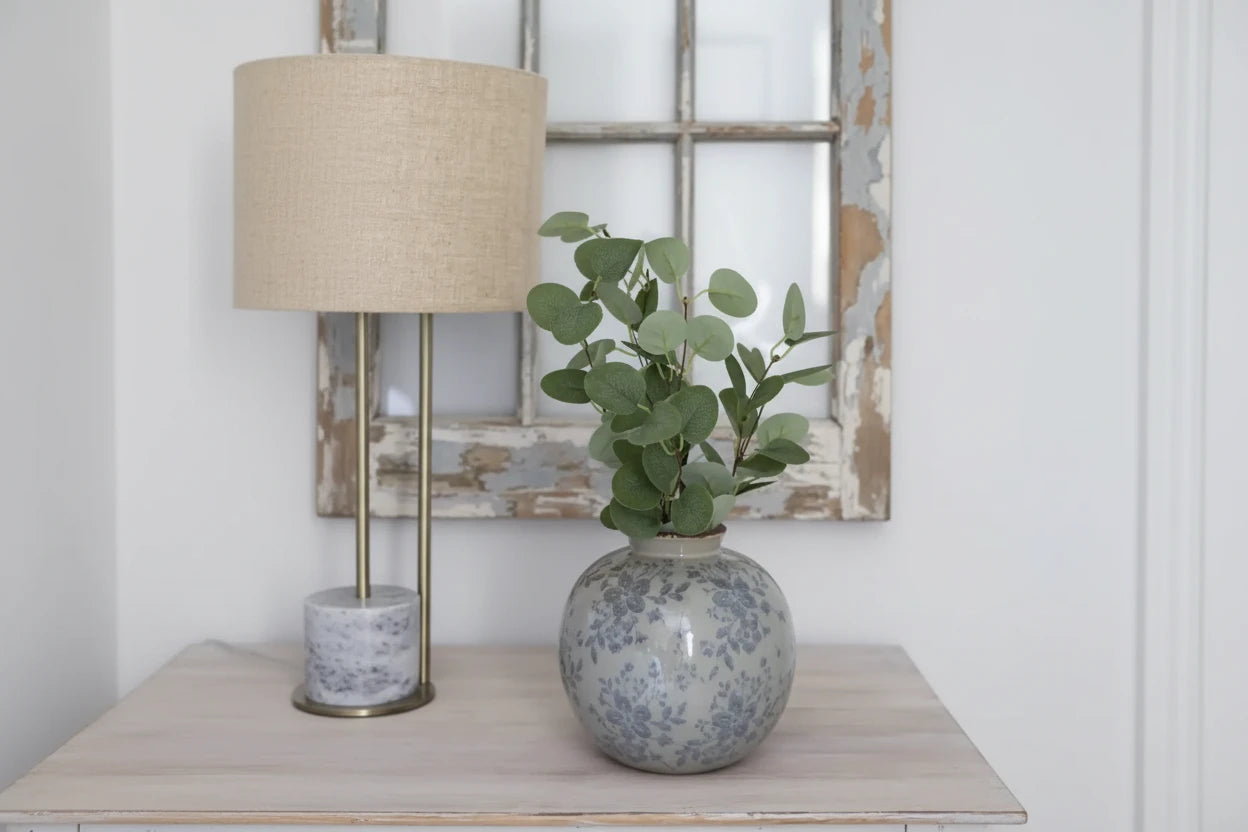 ROUND VASE WITH BLUE FLORAL PATTERN